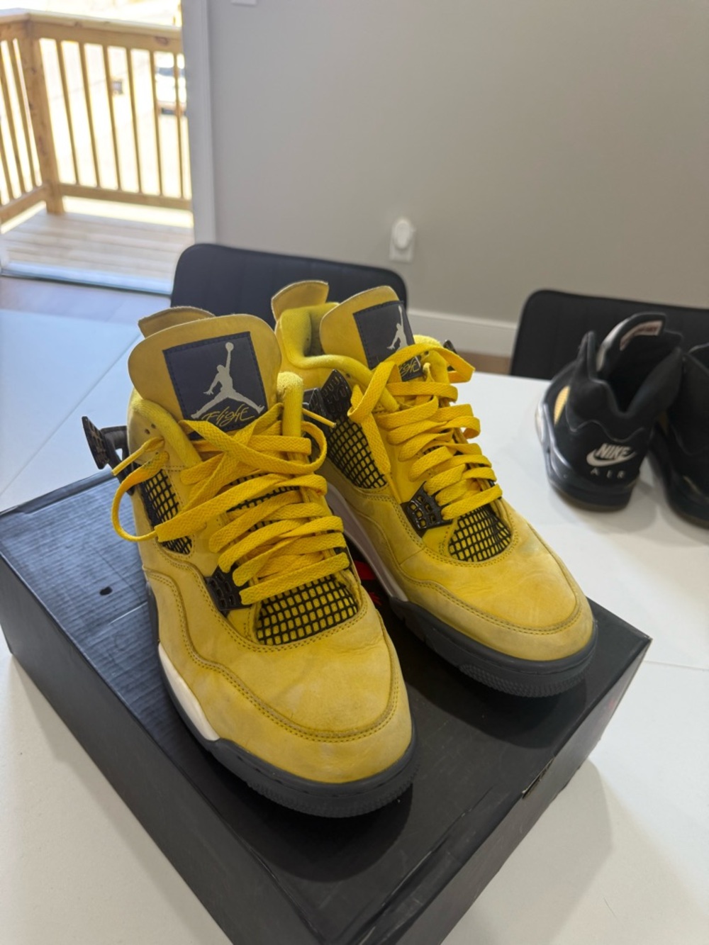Jordan 4 Men’s Yellow and Black High-Top Sneakers